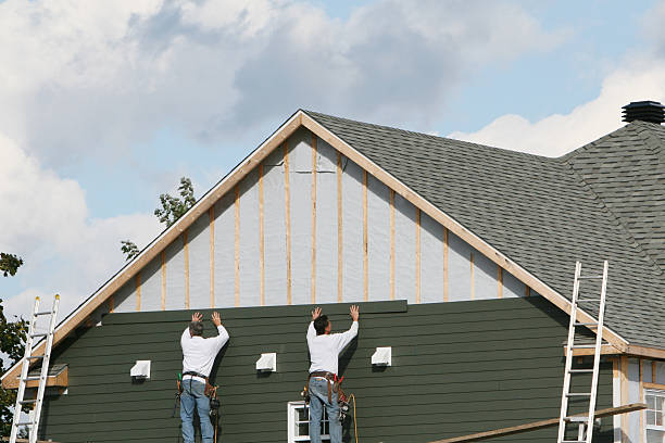 Professional Siding technician working in Cologne, NJ